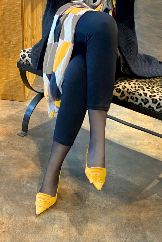 Yellow women's slingback shoes. Pointed toe. Medium spool heels. Worn view - Florence KOOIJMAN